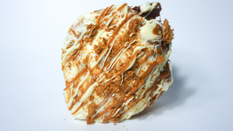 Cinnamon and Nutmeg filled centre, Loads of Lotus Biscoff Cookies. Finished with a white chocolate, and Biscoff drizzle